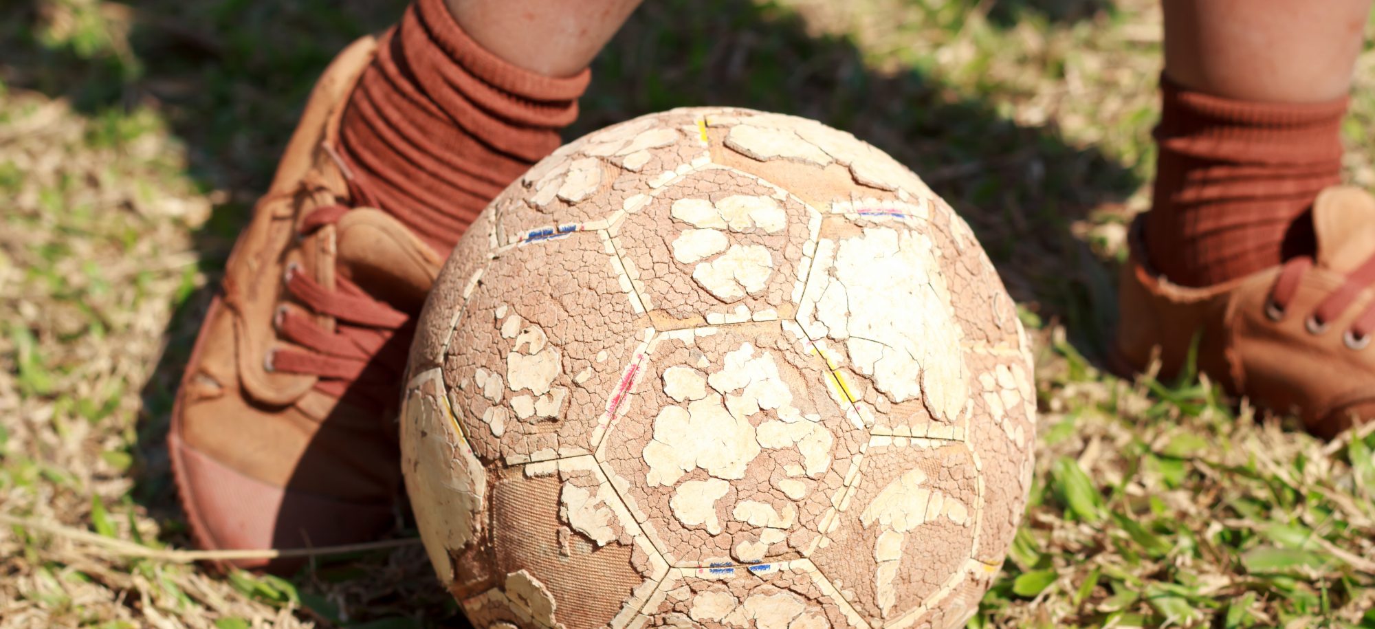 The boy Play soccer.